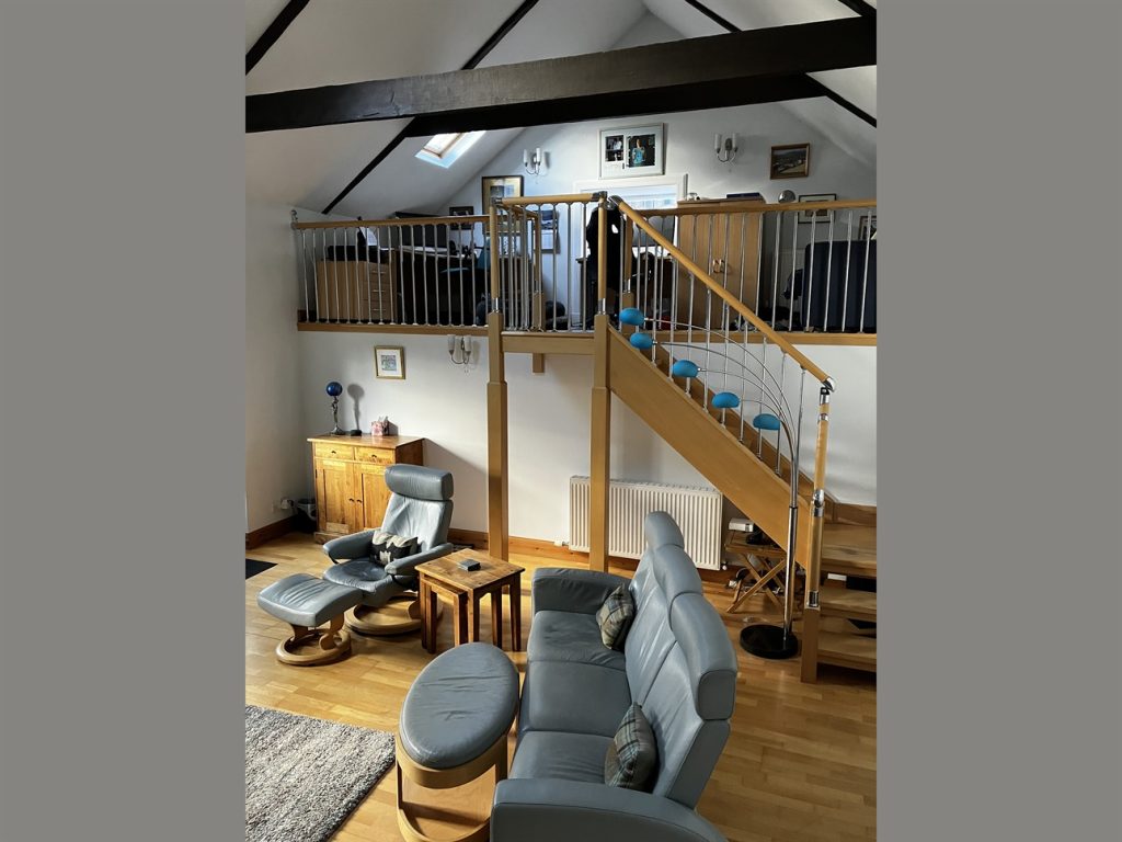 Living area and office with stairs